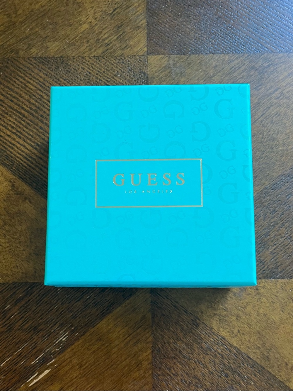 GUESS Gold-Tone Charm Bracelet with Black Accent - 7.5in - Picture 4 of 4